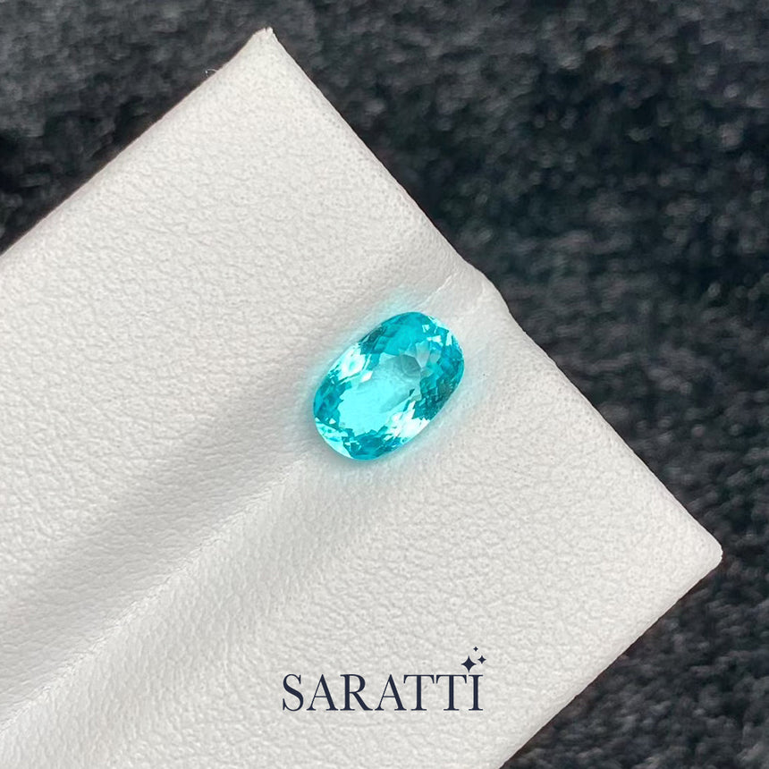 natural paraiba type tourmaline neon blue oval cut side angle light reflection | SARATTI