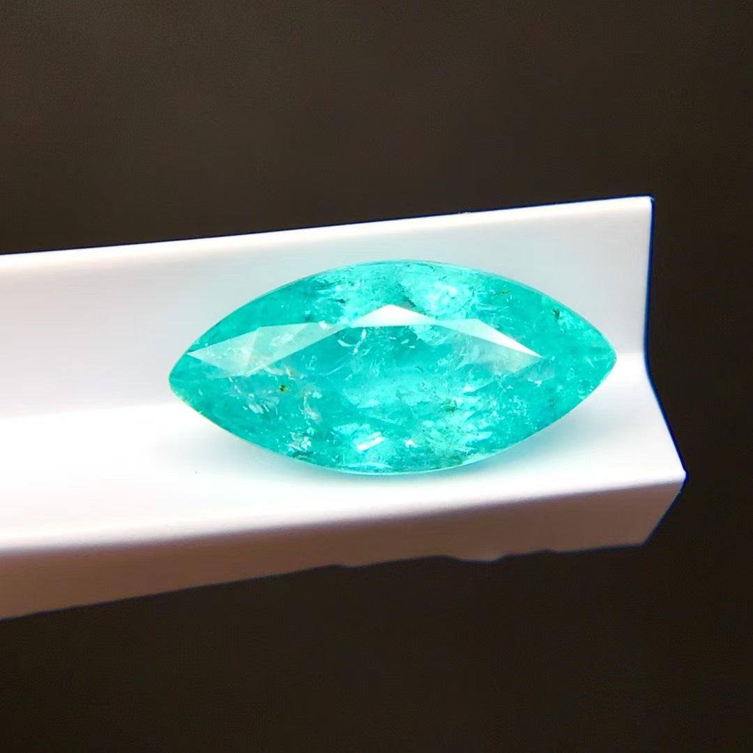 natural tourmaline marquise faceted gemstone elongated shape macro | SARATTI