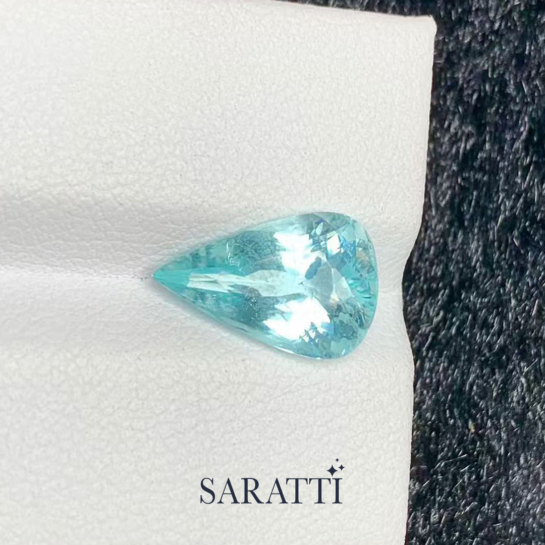 natural tourmaline pear faceted gemstone transparent center macro view | SARATTI