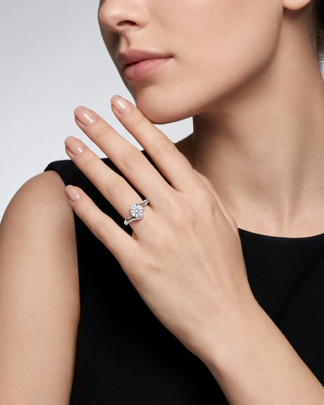 NERA 1 carat round natural diamond bypass split-shank engagement ring in 18K white gold, worn on hand | SARATTI