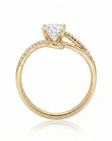 NERA 1 carat round natural diamond bypass split-shank engagement ring in 18K yellow gold, side profile showing four-prong crown | SARATTI