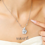 Rosée d’Éclat platinum diamond rose earrings with layered petal detailing | SARATTI