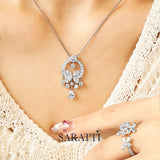 Lab diamond halo pendant with pear drops | SARATTI