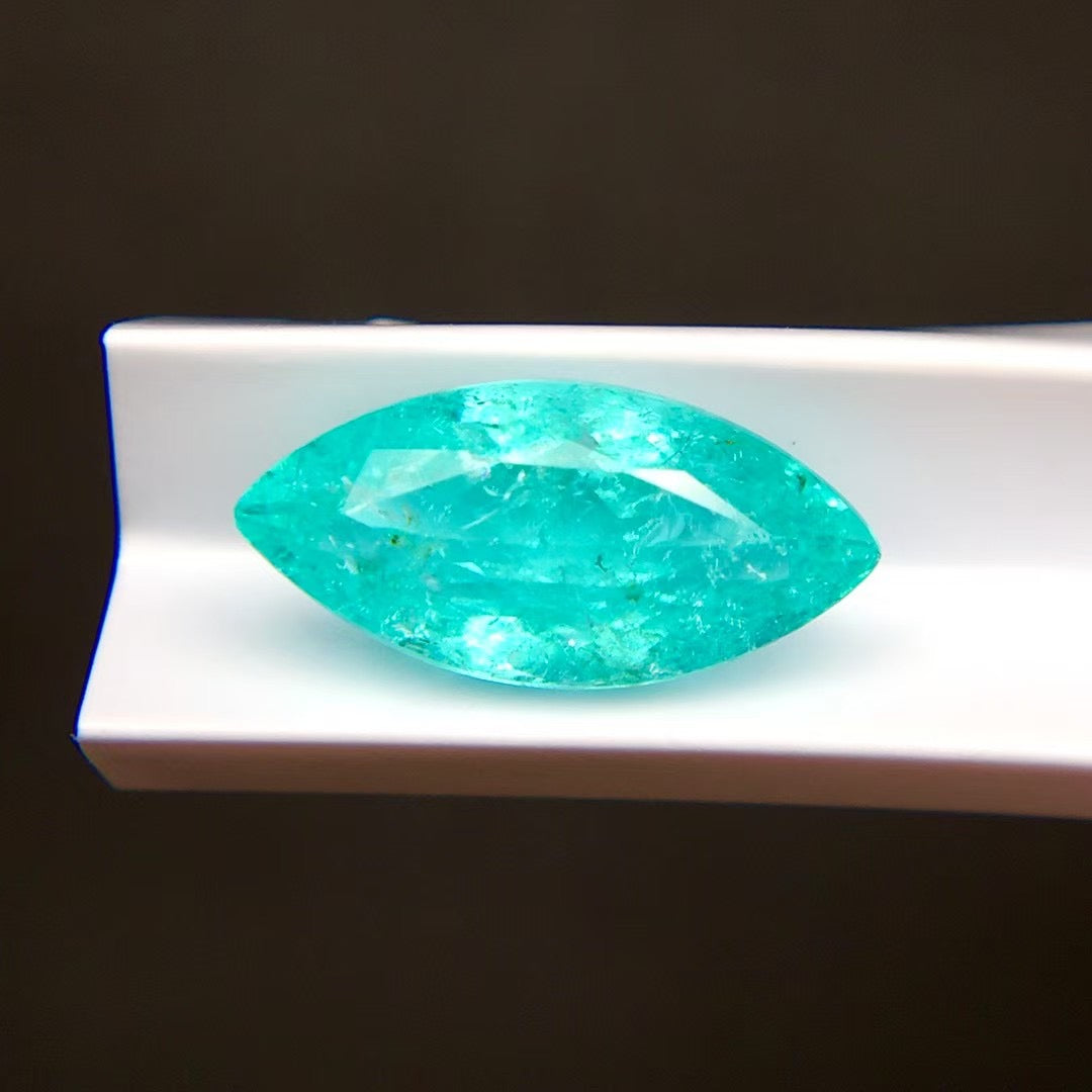 paraiba type tourmaline neon blue marquise cut side angle light reflection | SARATTI