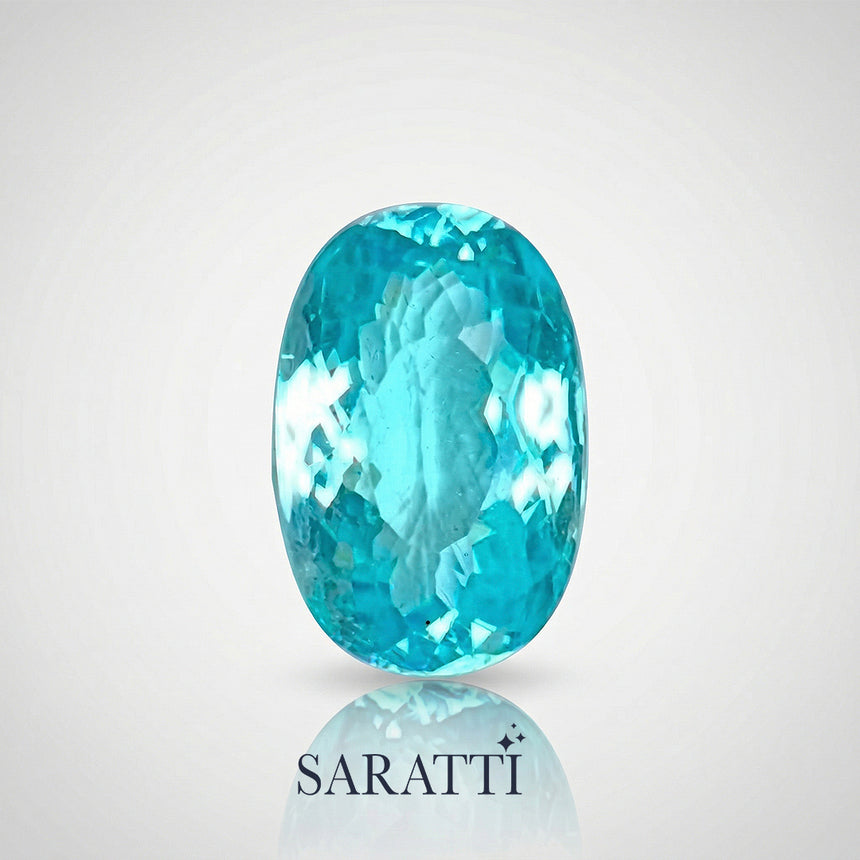 paraiba type tourmaline oval faceted gemstone compact saturated tone macro | SARATTI