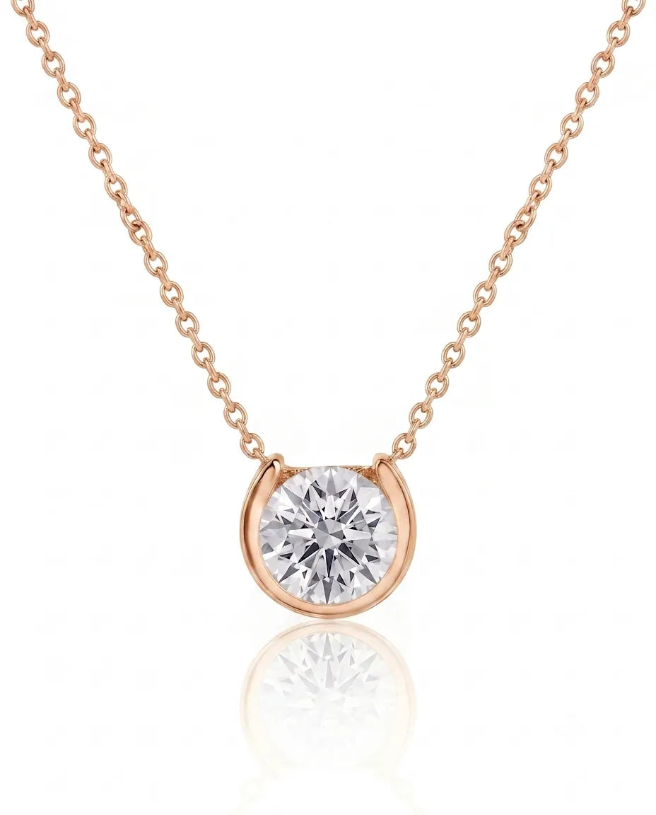 Petite bezel round diamond solitaire necklace in 18K Rose Gold, front view | SARATTI