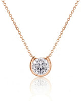 Petite bezel round diamond solitaire necklace in 18K Rose Gold, front view | SARATTI