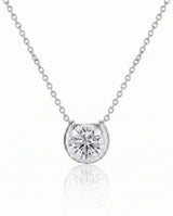 Petite bezel round diamond solitaire necklace in 18K White Gold, front view | SARATTI
