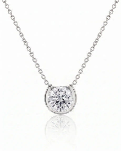 Petite bezel round diamond solitaire necklace in 18K White Gold, front view | SARATTI
