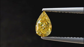 1.12 carat fancy pear cut yellowish champagne colored diamond