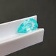 paraiba tourmaline pear cut side angle light reflection gemstone | SARATTI