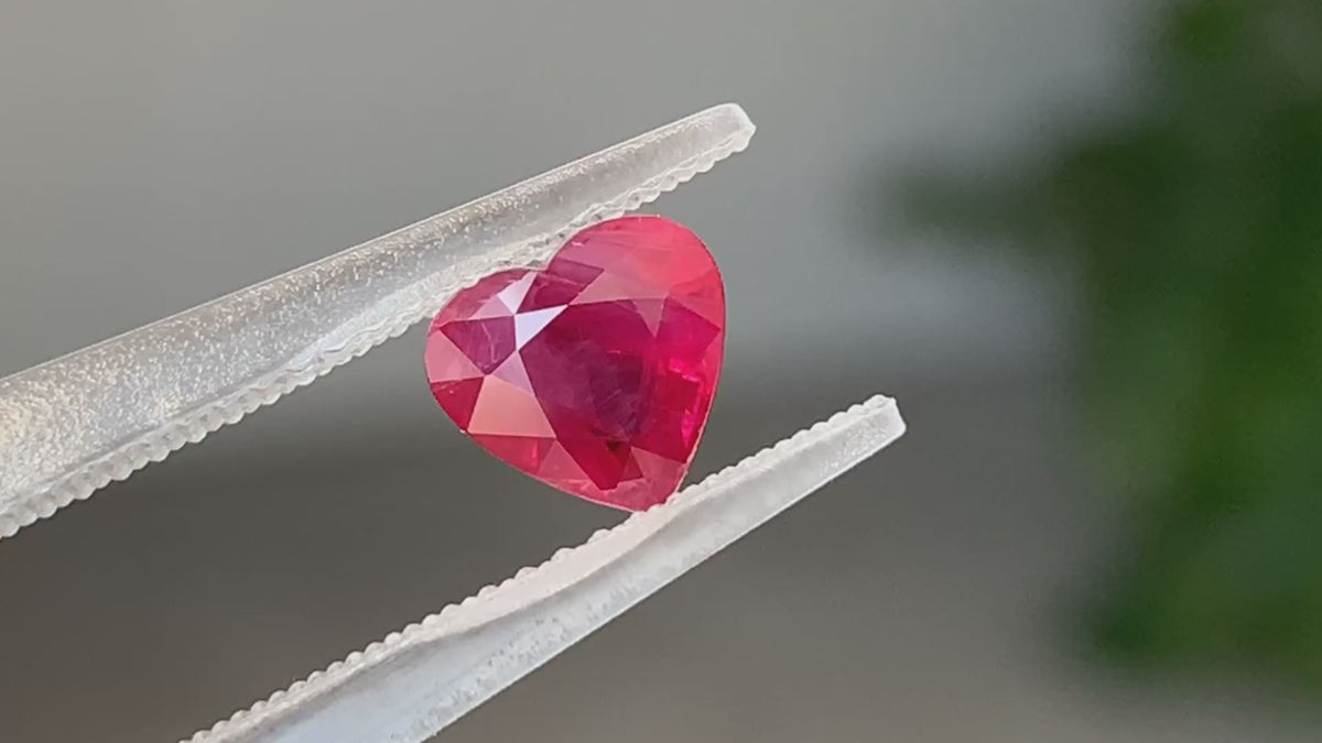 Loose 1.24 CTS Natural Burmese Ruby heart gemstone photographed in detailed close view | SARATTI