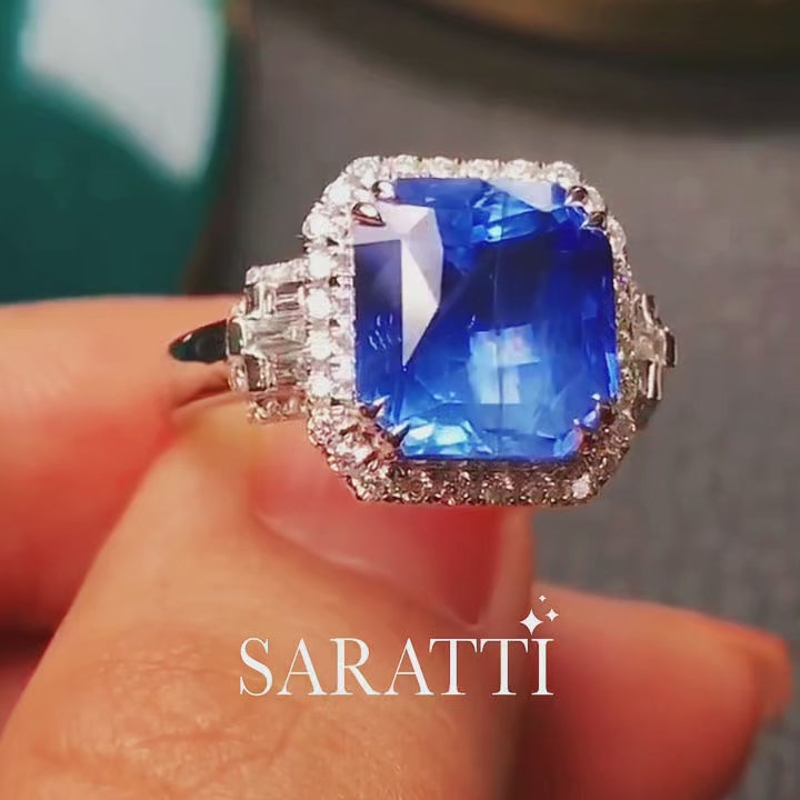 Luxury blue sapphire diamond ring crafted in polished 18K white gold | SARATTI