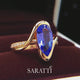 Pear Cut Tanzanite Ring in Yellow Gold