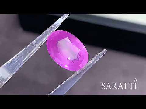 Pinkish purple Natural sapphire oval cut loose gemstone angled view | SARATTI  
