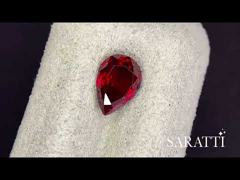 Pigeon’s blood Natural ruby pear faceted gemstone angled view | SARATTI  