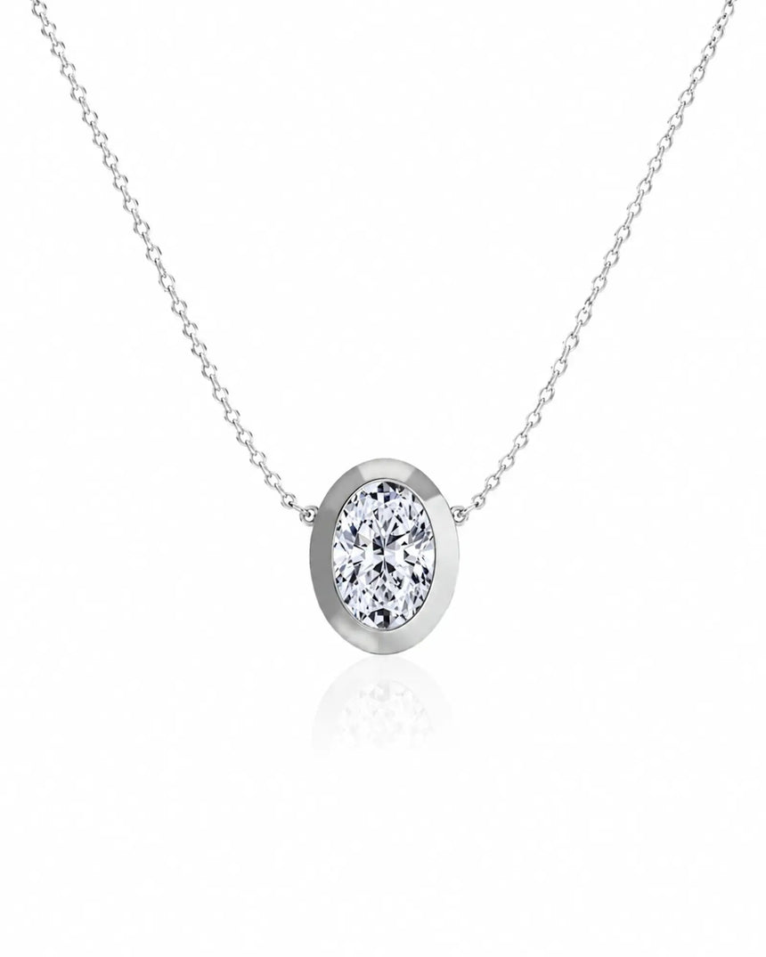SOLARA Bezel-Set Oval Cut solitaire necklace setting in white gold, front view | SARATTI