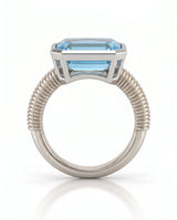 Rivage Bezel emerald-cut Aquamarine ribbed bezel solitaire ring setting in Platinum, front view | SARATTI