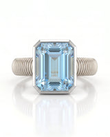 Rivage Bezel emerald-cut Aquamarine ribbed bezel solitaire ring setting in Platinum, side view | SARATTI