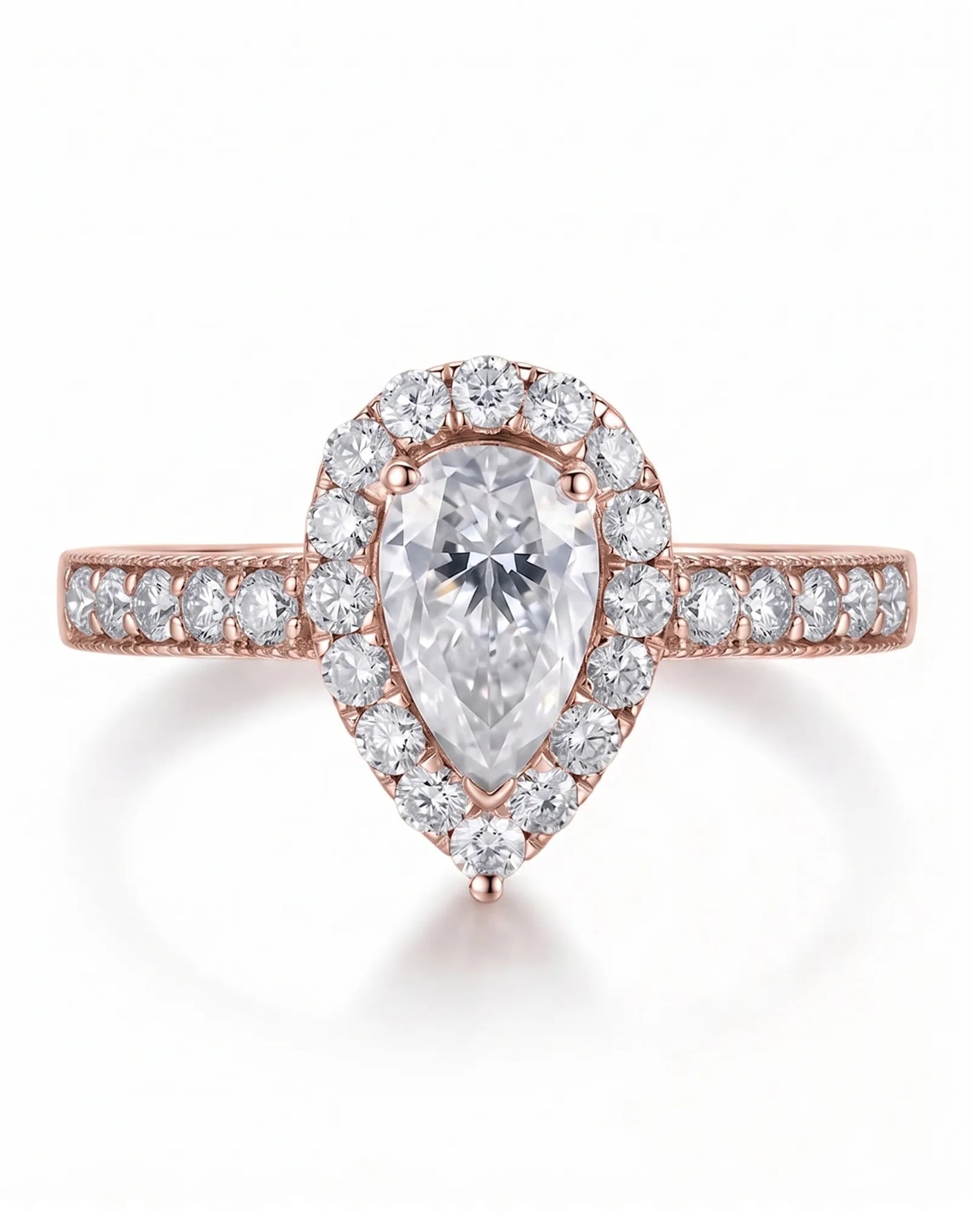 ROSE 1 carat F-colour pear natural diamond halo ring in 18K rose gold, front view of pear halo and pavé band | SARATTI