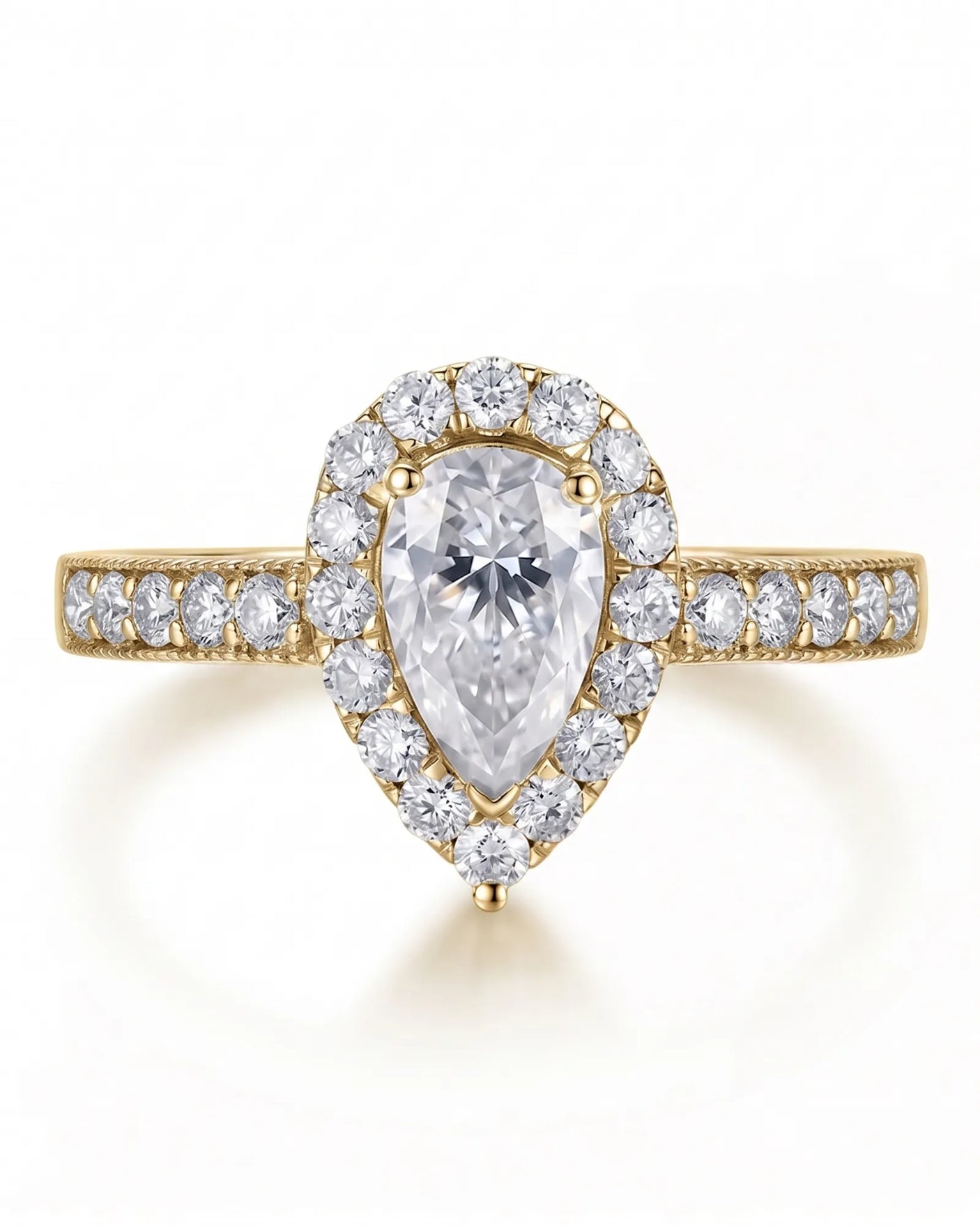 ROSE 1 carat F-colour pear natural diamond halo ring in 18K yellow gold, front view of pear halo and pavé band | SARATTI
