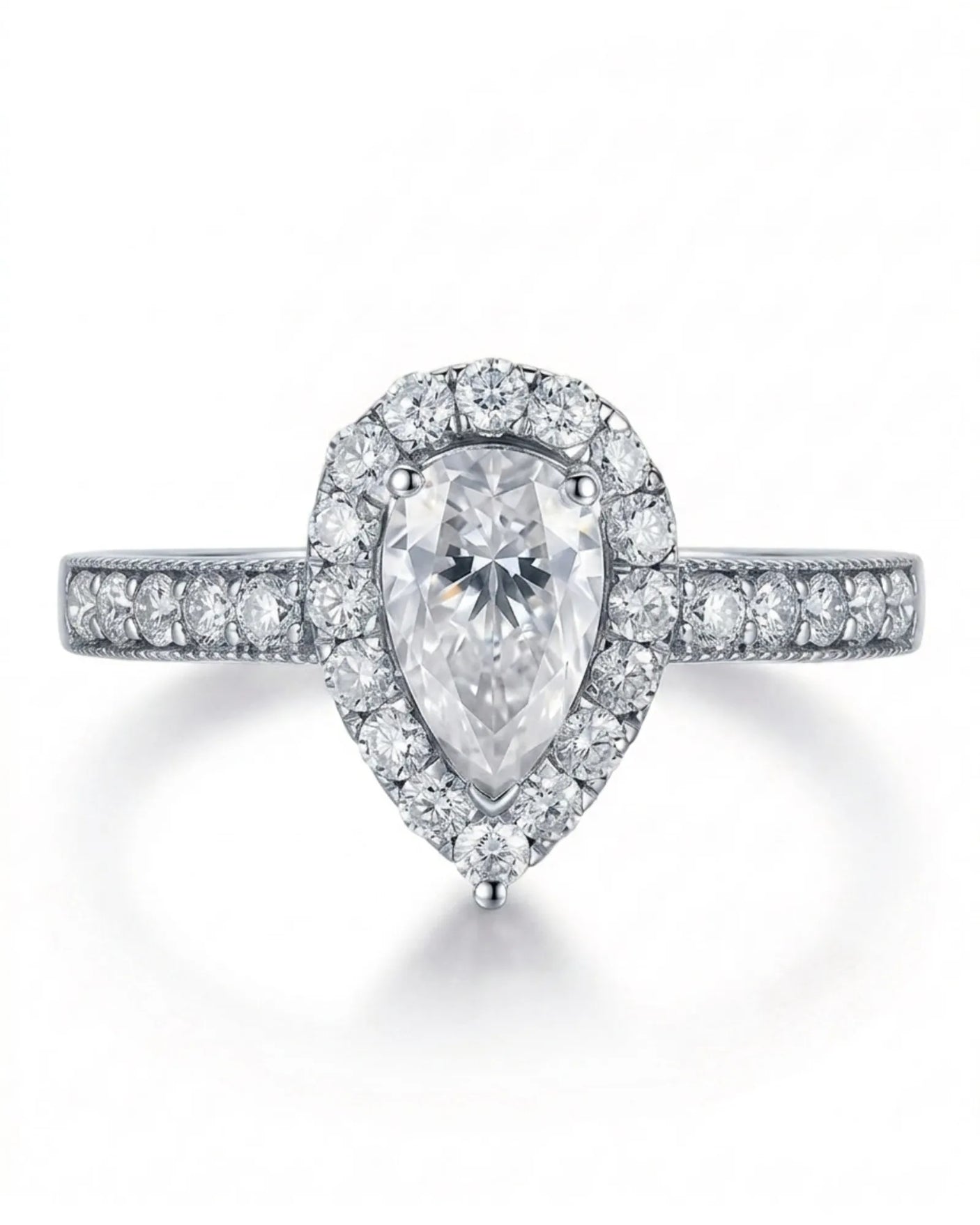 ROSE 1 carat F-colour pear natural diamond halo ring in platinum, front view of pear halo and pavé band | SARATTI