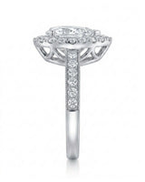ROSE 1 carat F-colour pear natural diamond halo ring in platinum, side profile showing raised halo gallery | SARATTI