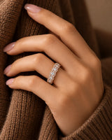 Round diamond cluster wedding band in 18K rose gold worn on the hand | SARATTI