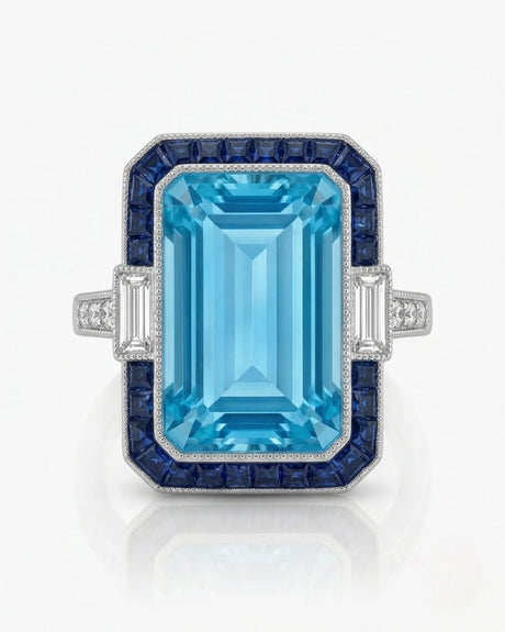 Saphira Line emerald-cut Aquamarine ring setting in Platinum, front view with blue sapphire halo and baguette side diamonds | SARATTI