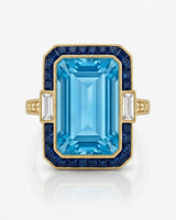 Saphira Line emerald-cut Aquamarine ring setting in yellow gold, front view with blue sapphire halo and baguette side diamonds | SARATTI