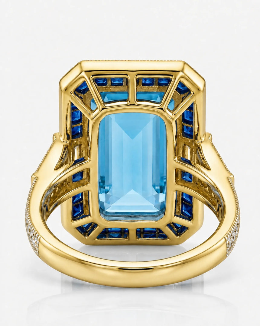Saphira Line emerald-cut Aquamarine ring setting in yellow gold, underside showing geometric sapphire gallery and split shoulder construction | SARATTI