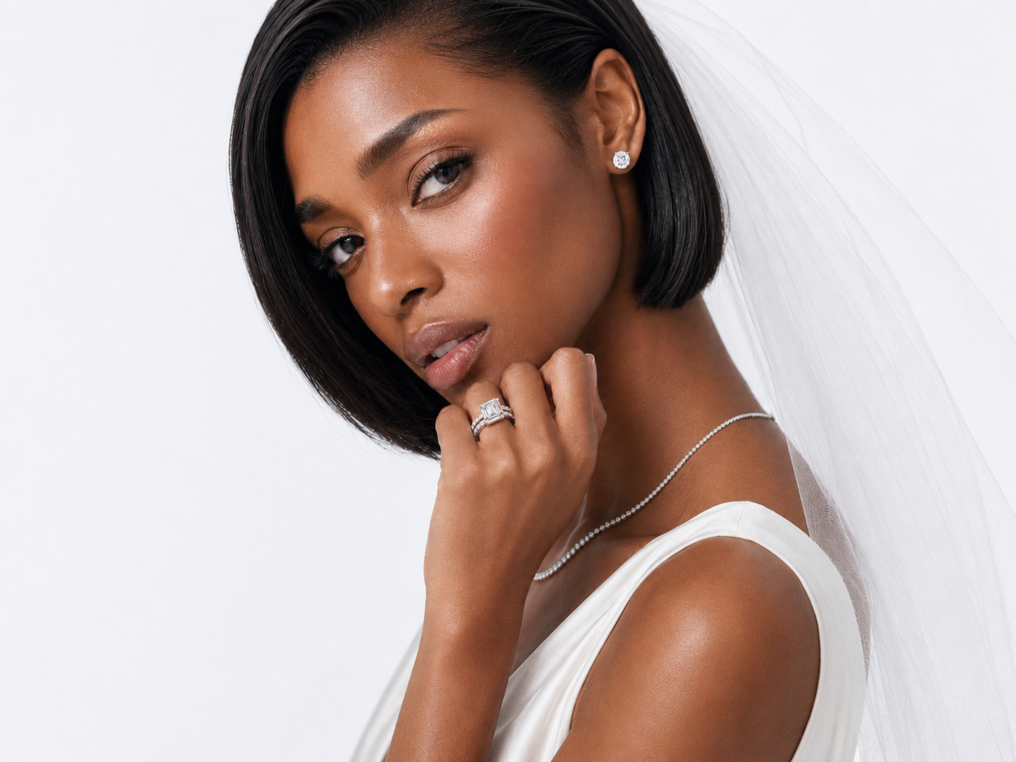 The 4Cs of a diamond illustrating cut, clarity, colour, and carat weight | SARATTI