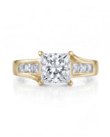 SIENA 1 carat princess-cut natural diamond engagement ring in 18K yellow gold, front view of split shoulders and princess side diamonds | SARATTI