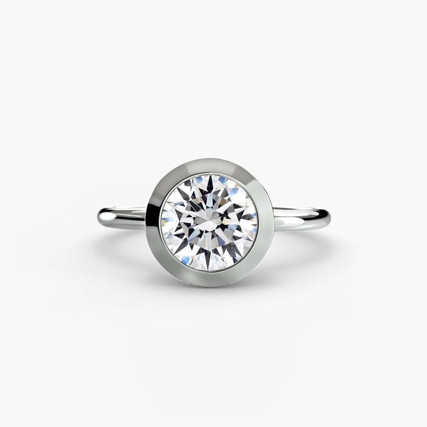 SOLARA – Round Cut Bezel-Set Solitaire Ring Setting in White Gold | SARATTI