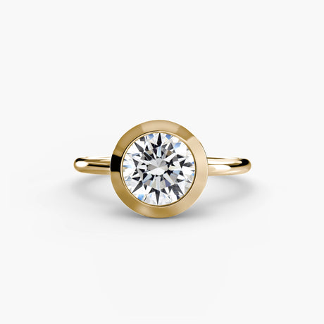 SOLARA – Round Cut Bezel-Set Solitaire Ring Setting in Yellow Gold | SARATTI