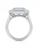 Solenne Halo emerald cut Aquamarine diamond cathedral ring setting in Platinum, profile view | SARATTI