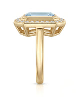 Solenne Halo emerald cut Aquamarine diamond cathedral ring setting in yellow gold, profile view | SARATTI