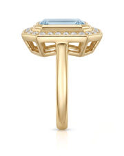 Solenne Halo emerald cut Aquamarine diamond cathedral ring setting in yellow gold, profile view | SARATTI