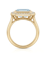 Solenne Halo emerald cut Aquamarine diamond cathedral ring setting in yellow gold, side view | SARATTI