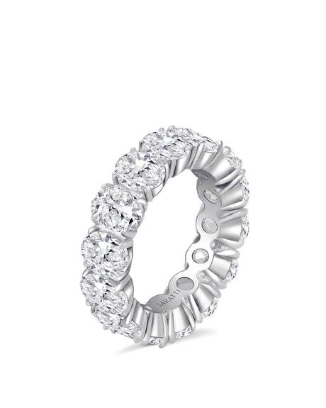 Thick oval diamond eternity wedding band with a continuous full-circle setting | SARATTI