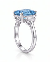 Trilune emerald-cut Aquamarine emerald-diamond step-cut three-stone ring setting in Platinum, top view | SARATTI