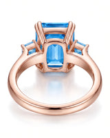 Trilune emerald-cut Aquamarine emerald-diamond step-cut three-stone ring setting in Rose Gold, profile view | SARATTI