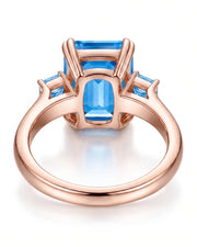 Trilune emerald-cut Aquamarine emerald-diamond step-cut three-stone ring setting in Rose Gold, profile view | SARATTI