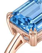 Trilune emerald-cut Aquamarine emerald-diamond step-cut three-stone ring setting in Rose Gold, top view | SARATTI