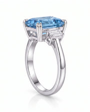 Trilune emerald-cut Aquamarine emerald-diamond step-cut three-stone ring setting in White Gold, alternate front view | SARATTI