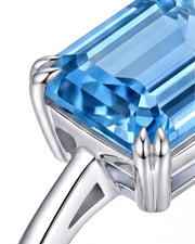Trilune emerald-cut Aquamarine emerald-diamond step-cut three-stone ring setting in White Gold, top view | SARATTI