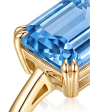 Trilune emerald-cut Aquamarine emerald-diamond step-cut three-stone ring setting in Yellow Gold, profile view | SARATTI