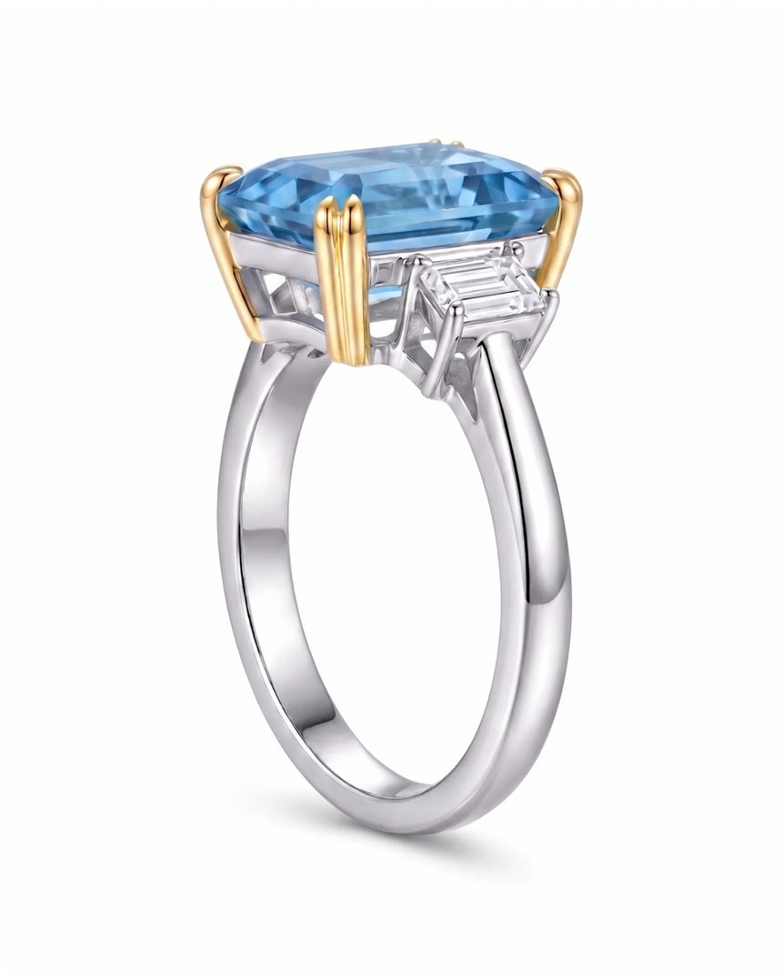 Trilune emerald-cut Aquamarine emerald-diamond three-stone ring setting in Yellow & White Gold, 45 degree view | SARATTI