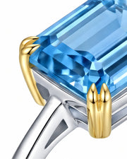 Trilune emerald-cut Aquamarine emerald-diamond three-stone ring setting in Yellow & White Gold, setting detail | SARATTI