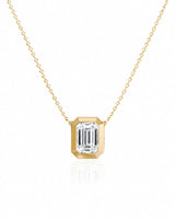 SOLARA Bezel-Set Emerald Cut solitaire necklace setting in yellow gold, front view | SARATTI